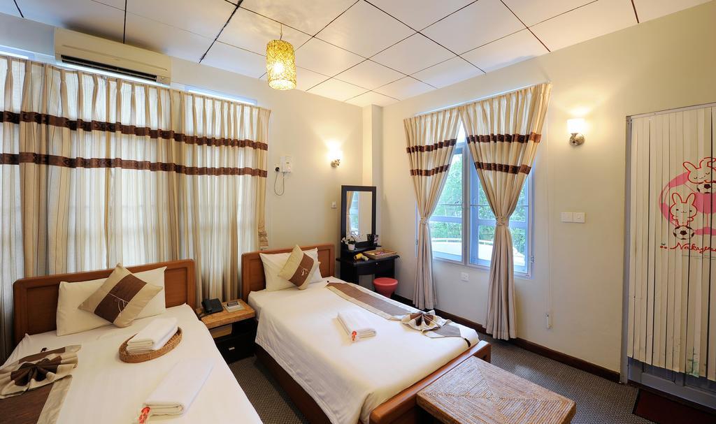 Cinderella Hotel Mawlamyaing Zimmer foto